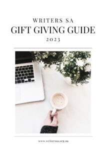 the Writers SA gift guide cover features a laptop and hand holding a hot chocolate